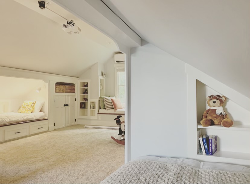 Built-in shelves in bed attic renovation