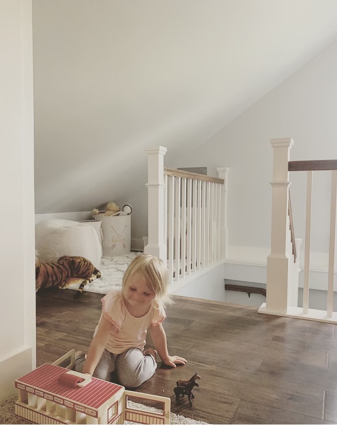 Attic staircase and reading nook