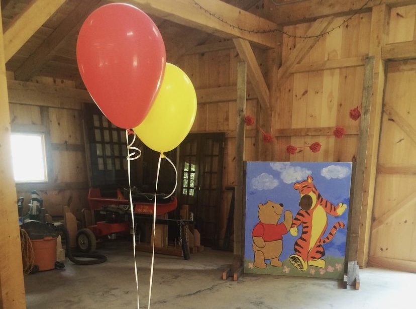 Pooh and Tigger Photo Op with red and yellow balloons in barn