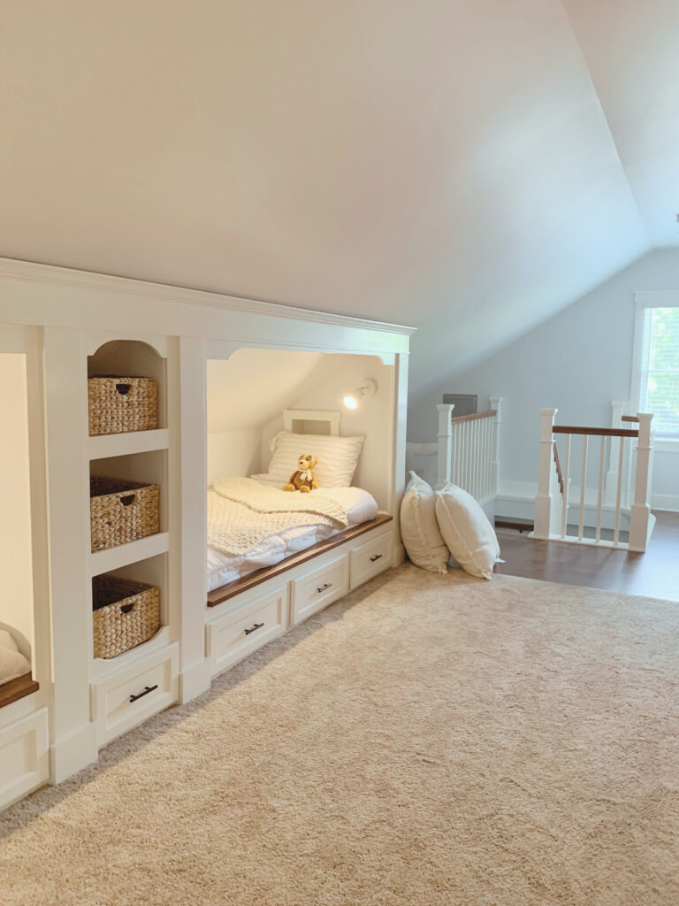 Built-in beds and staircase in attic