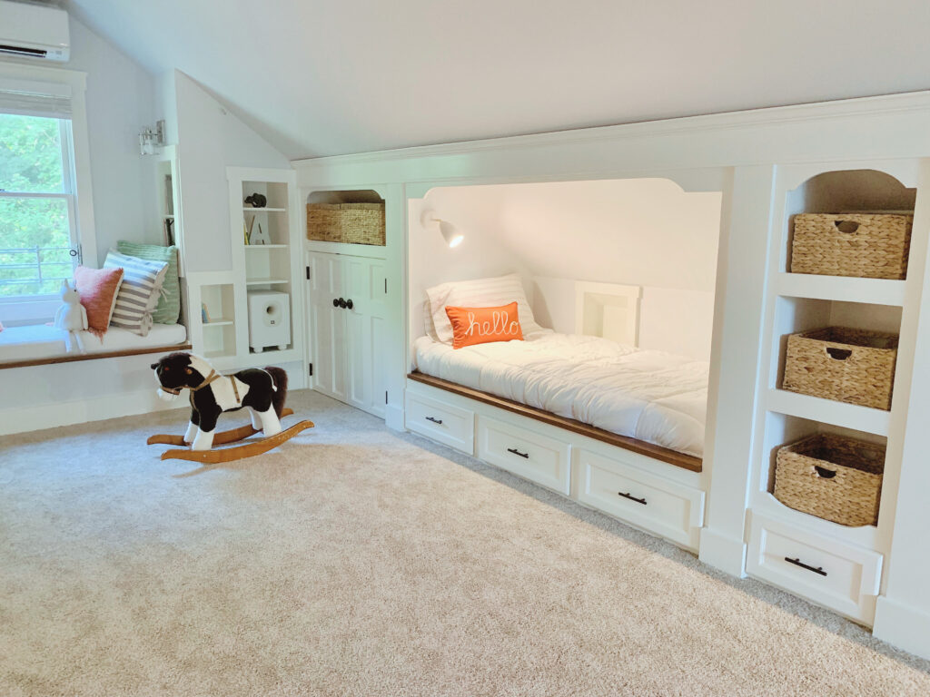 Attic Built-in bunk bed with light turned on