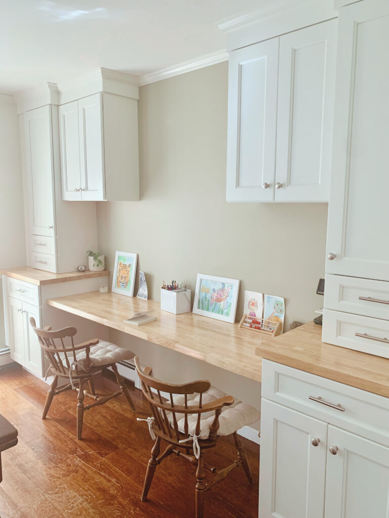 White Custom built in homeschool desks and cabinets