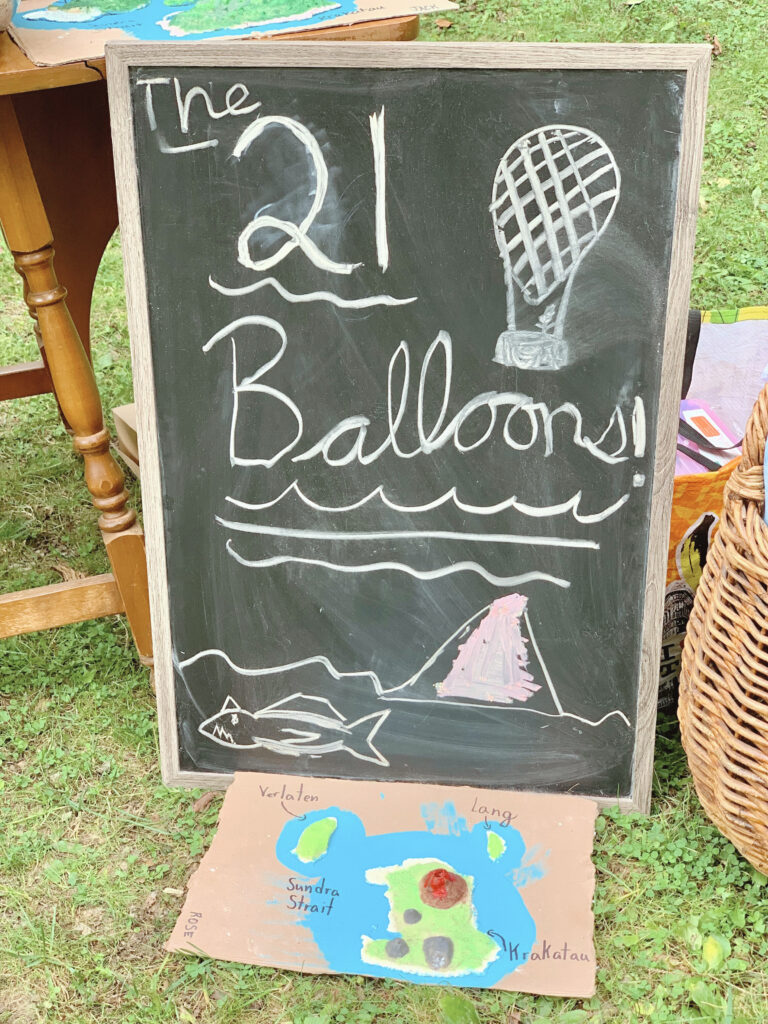 Twenty one balloons written on blackboard artwork and salt dough map of Krakatoa 