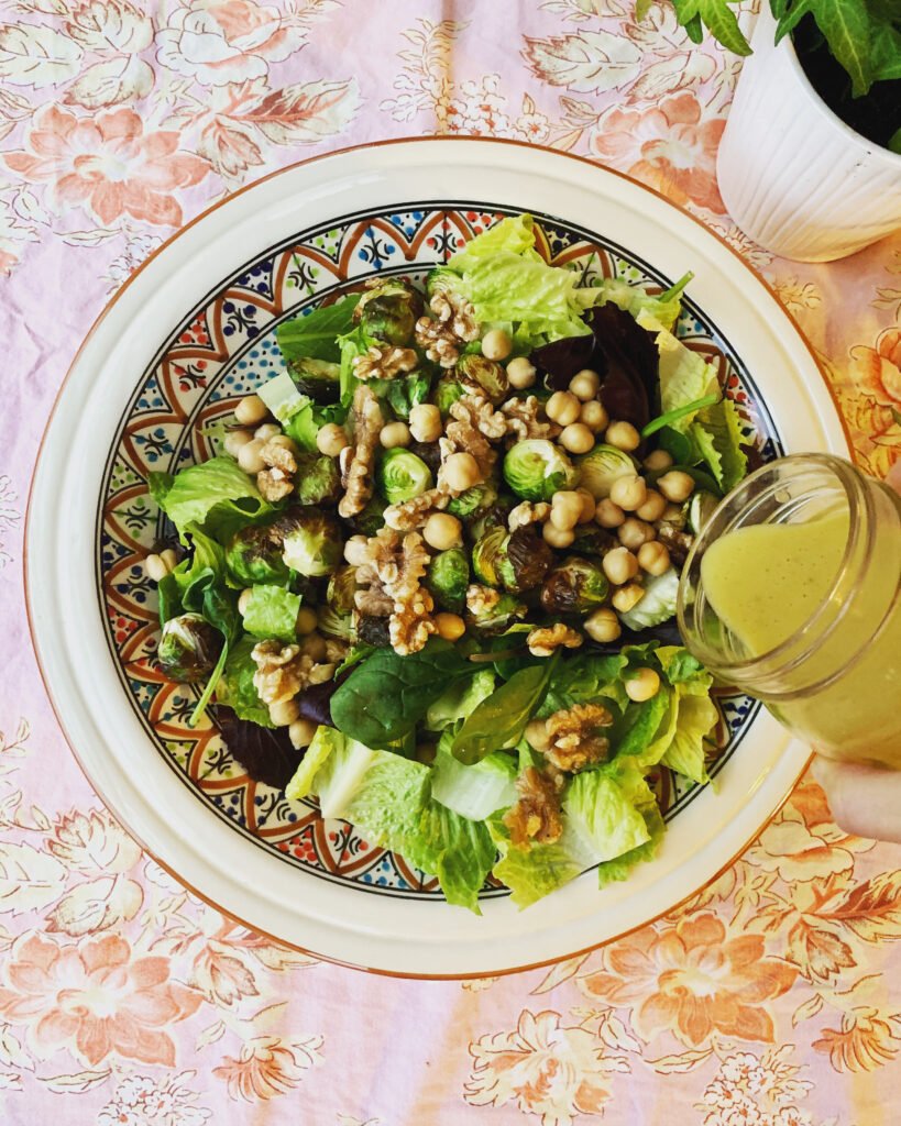 Healthy nutrition homemade Salad on tablecloth with greens Brussels sprouts chickpeas garbanzo beans with 