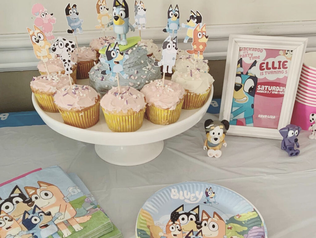 Adorable Bluey dessert table with invitation and decor