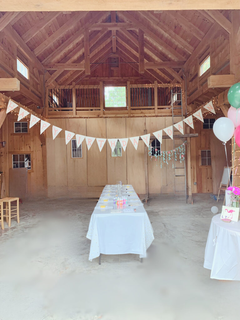 Craft table setup for panda party in barn 