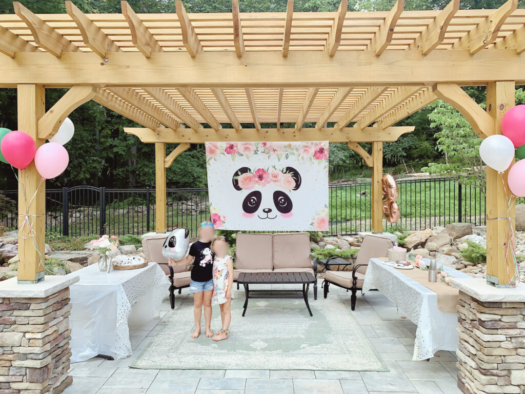 Party like a panda party decor and setup under pergola with dessert table