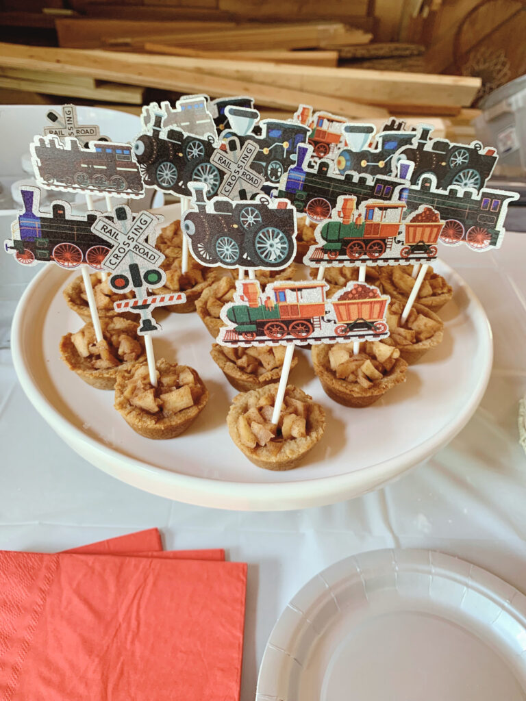 Apple pie tartlets with train cupcake toppers