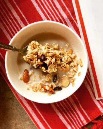 granola in bowl on red towel