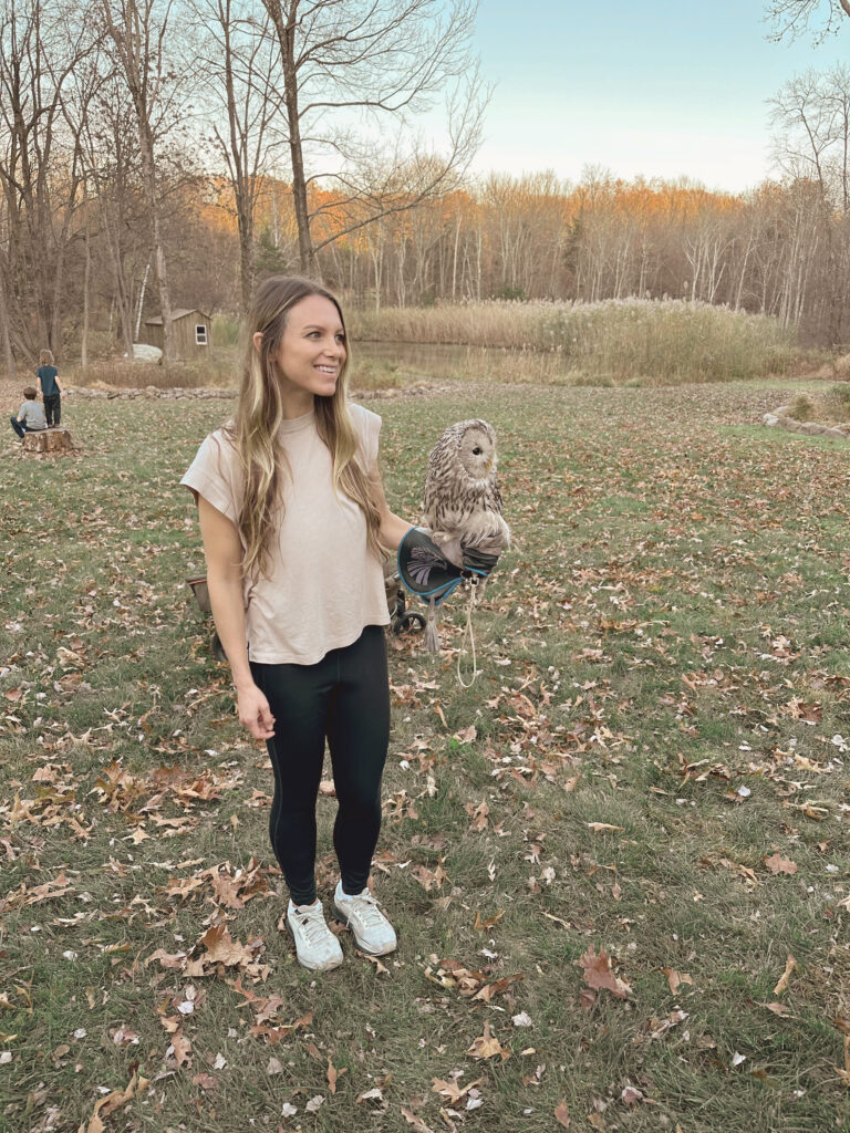 Woman holding owl